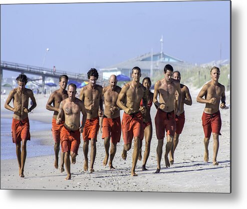  Life Guard Metal Print featuring the photograph Kure Beach Life guards on the run by WAZgriffin Digital