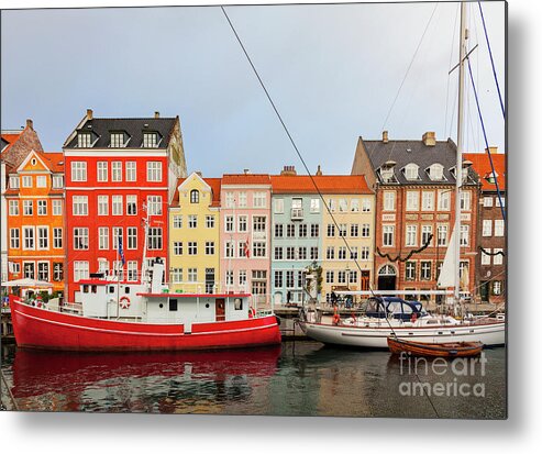 Christmas Metal Print featuring the photograph Nyhavn in Copenhagen Denmark by Sophie McAulay