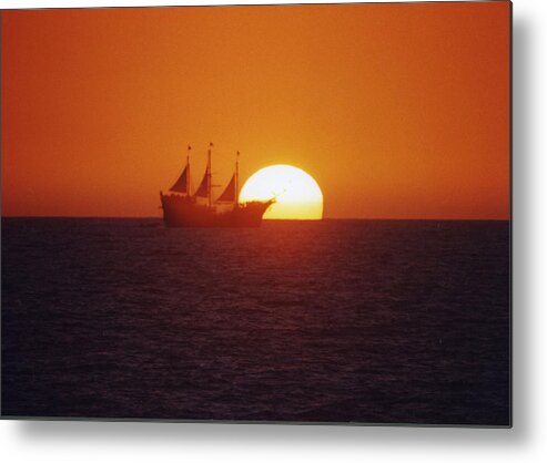Sunset Photo's Metal Print featuring the photograph Pirateship Sunset by Brent Easley