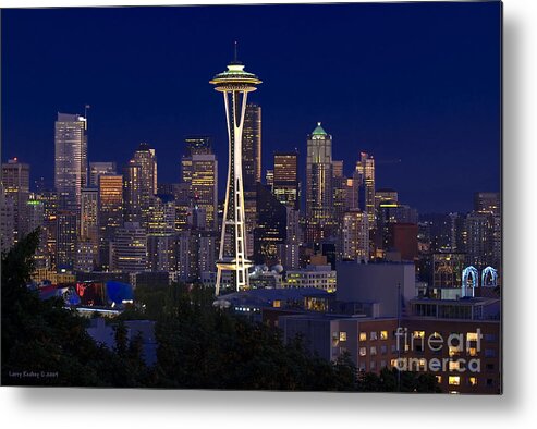 Seattle Metal Print featuring the photograph Seattle at Night by Larry Keahey