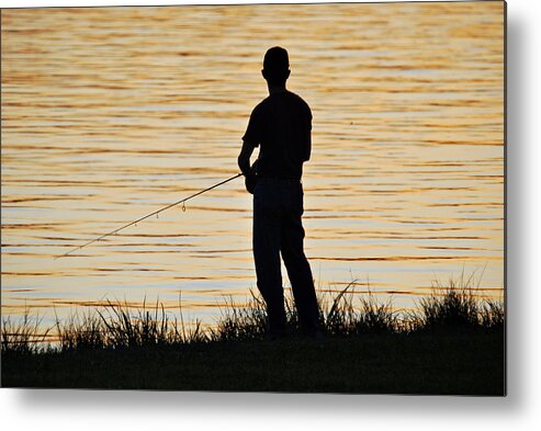 Fisherman Metal Print featuring the photograph Silhouetted Fisherman by Teresa Blanton