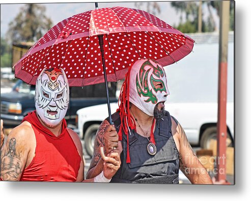 Luchadores Metal Print featuring the photograph Two Luchadores Going For a Stroll on a Hot Afternoon by Jim Fitzpatrick