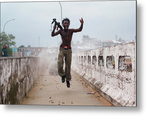People Metal Print featuring the photograph Liberian Government Troops Push Back #1 by Chris Hondros