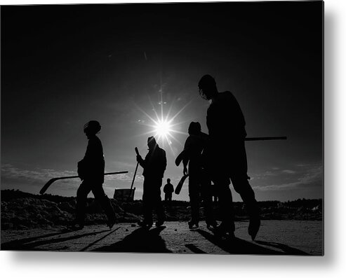 Following Metal Print featuring the photograph 2013 Usa Hockey Pond Hockey National #3 by Bruce Bennett