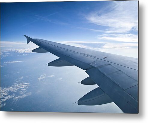 Scenics Metal Print featuring the photograph Airplane Wing In Flight by Ryanjlane