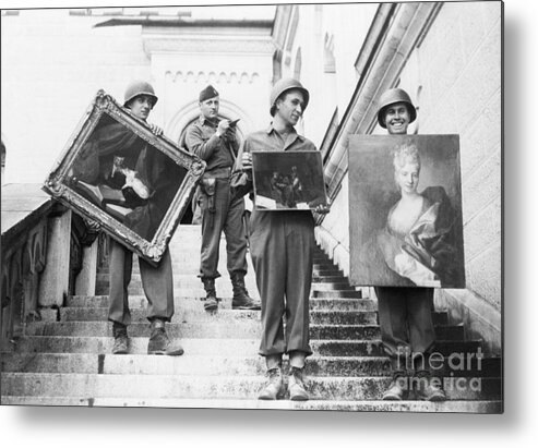 People Metal Print featuring the photograph Army Soldiers Carry Looted Paintings by Bettmann