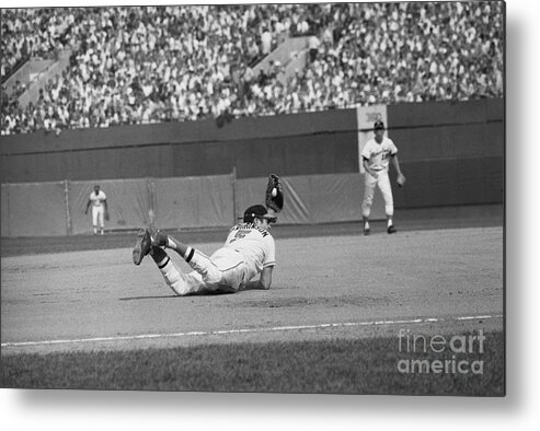 People Metal Print featuring the photograph Brooks Robinson Making Diving Catch by Bettmann