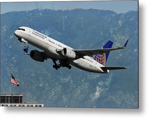 Continental Airlines Metal Print featuring the photograph Continental Airlines and American Flag by Erik Simonsen