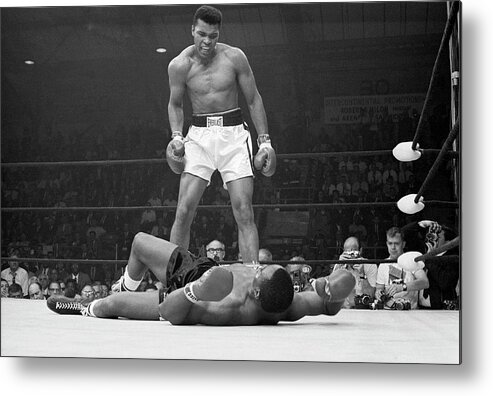 Heavyweight Metal Print featuring the photograph Muhammad Ali Taunting Sonny Liston by Bettmann