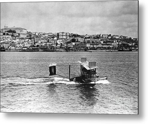 1910-1919 Metal Print featuring the photograph Navy Airplane In Lisbon Harbor by Bettmann