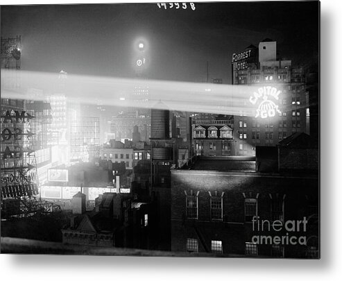 Finance And Economy Metal Print featuring the photograph Projecting Ad On Skyscrapers by Bettmann