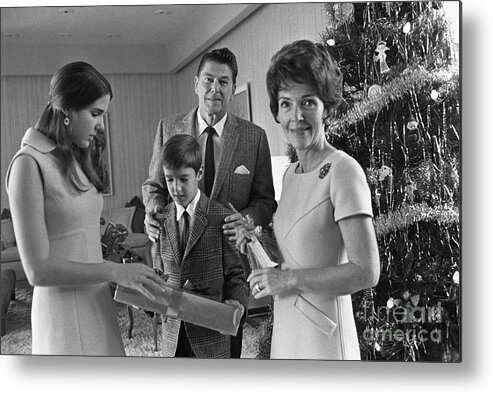 Mature Adult Metal Print featuring the photograph Reagan Family Around Christmas Tree by Bettmann