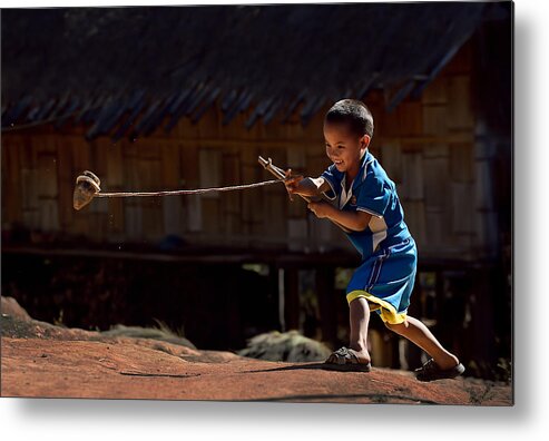 Action Metal Print featuring the photograph Spin Topper by Vichaya