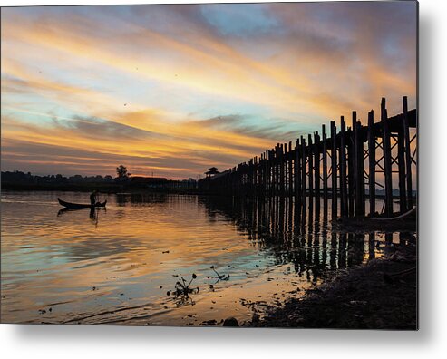 Fishing Metal Print featuring the photograph sunrise at U Bein Bridge, Mandalay, Myanmar by Ann Moore