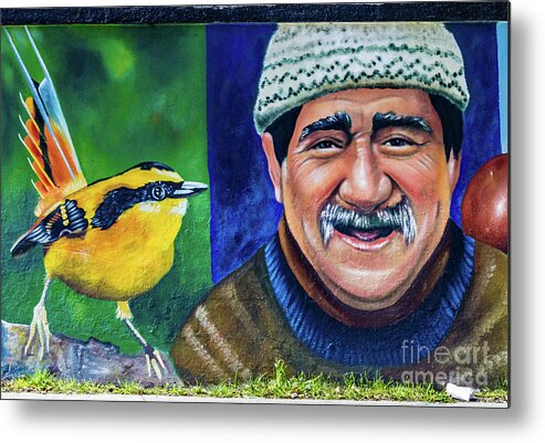 Mural Metal Print featuring the photograph Wall painting in Puerto Natales, Chile by Lyl Dil Creations