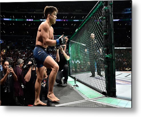 Event Metal Print featuring the photograph UFC 227: Johnson v Cejudo 2 #14 by Jeff Bottari