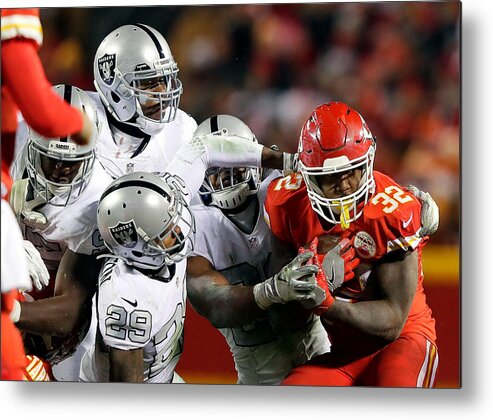 People Metal Print featuring the photograph Oakland Raiders v Kansas City Chiefs #27 by Jamie Squire
