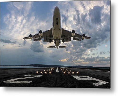Taking Off Metal Print featuring the photograph Passenger airplane taking off at sunset #3 by Guvendemir