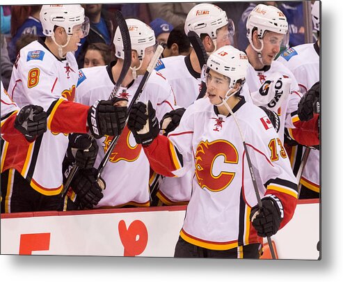 People Metal Print featuring the photograph Calgary Flames v Vancouver Canucks #42 by Rich Lam