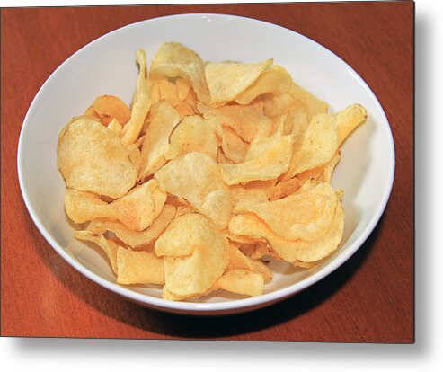 Unhealthy Eating Metal Print featuring the photograph A bowl of salty kettle cooked potato chips by Zen Rial