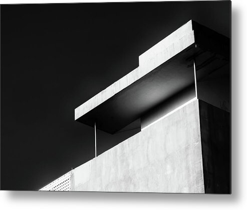 Black And White Metal Print featuring the photograph Abstract architecture design. Black and white futuristic exterior background. Black sky copy-space by Michalakis Ppalis