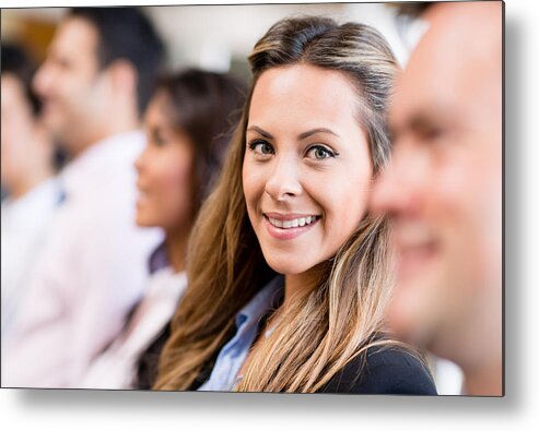 Young Men Metal Print featuring the photograph Business woman with a group by Andresr