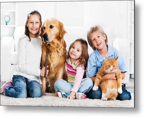 Pets Metal Print featuring the photograph Children with animals sitting on the carpet. by Skynesher