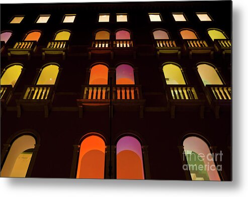 Venice Italy Metal Print featuring the photograph Coloured lights in the windows of the Benetton building in Venice, Italy by Neale And Judith Clark