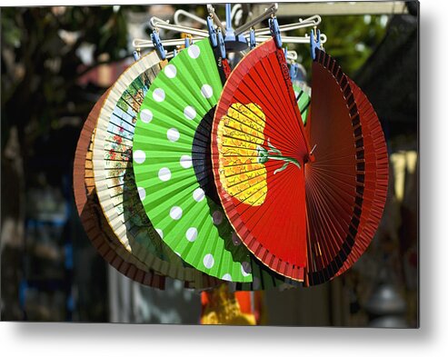 Cool Attitude Metal Print featuring the photograph Colourful Spanish fans for sale in marketplace by Lyn Holly Coorg