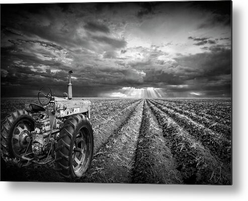 Art Metal Print featuring the photograph Farmall Tractor with Field Furrows and Sunburst Sky in Black and by Randall Nyhof