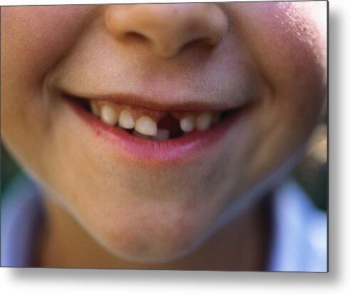 Child Metal Print featuring the photograph Gap-toothed smile by Laurence Mouton