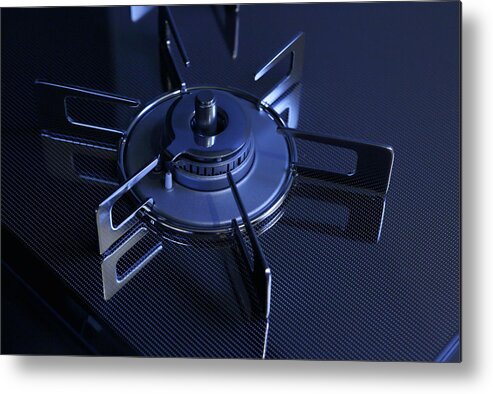 Gas Stove Burner Metal Print featuring the photograph Gas stove close up by Kumacore