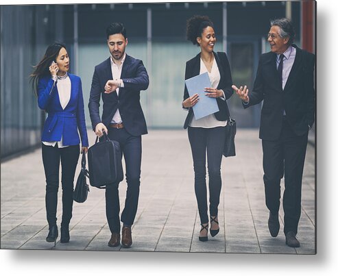 Group Of People Metal Print featuring the photograph Group of business people outdoors by Piranka
