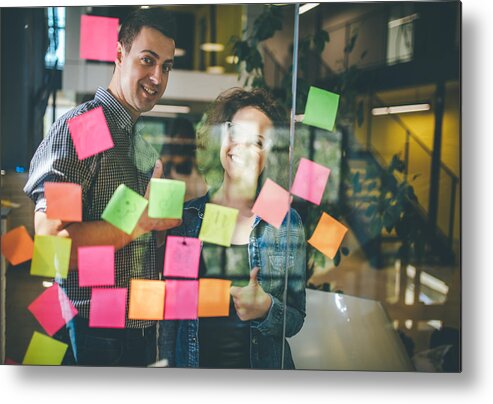 New Business Metal Print featuring the photograph Keeping business evolving with a creative brainstorming session by PhotoAttractive