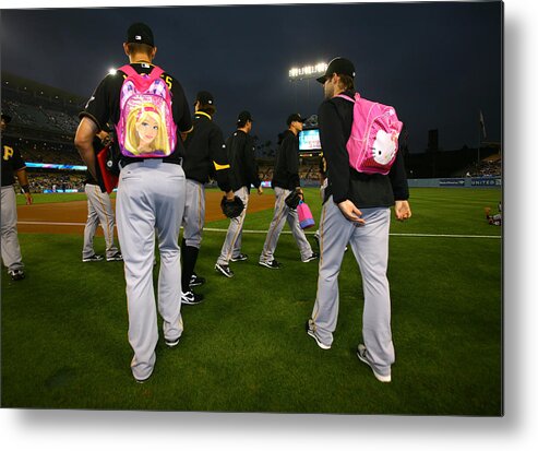 Child Metal Print featuring the photograph Pittsburgh Pirates v Los Angeles Dodgers by Stephen Dunn
