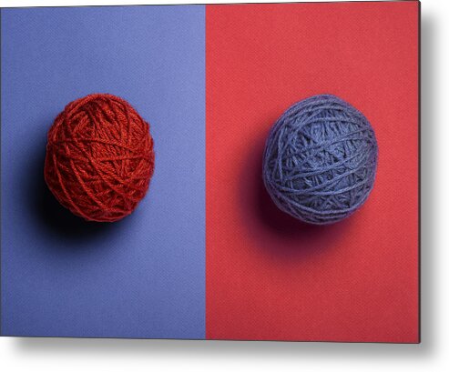 Two Objects Metal Print featuring the photograph Red and Blue Balls of Yarn by Jeffrey Coolidge