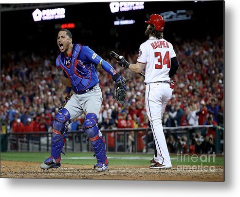 American League Baseball Metal Print featuring the photograph Willson Contreras and Bryce Harper by Win Mcnamee