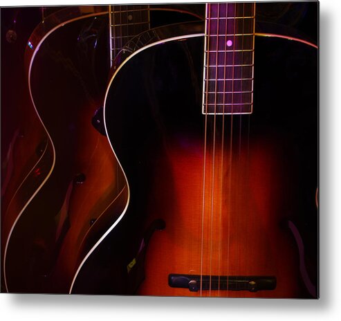 Guitars Metal Print featuring the photograph Row of guitars by Jim Mathis