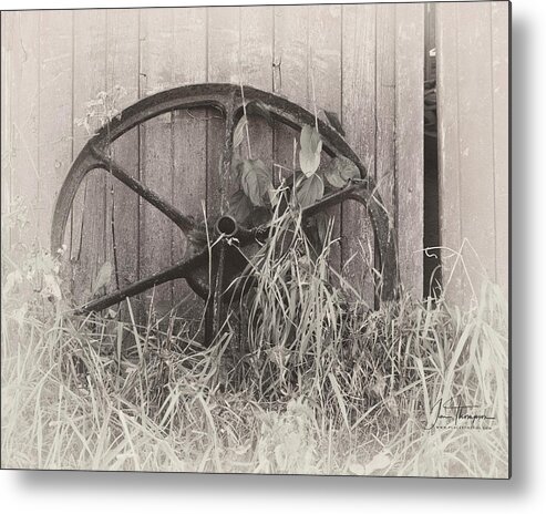 Farm Life Metal Print featuring the photograph Wagon Wheel by Jim Thompson