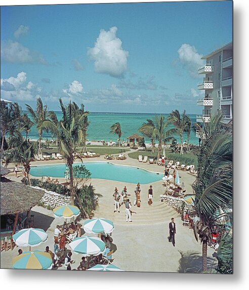 People Metal Print featuring the photograph Nassau Beach Hotel by Slim Aarons