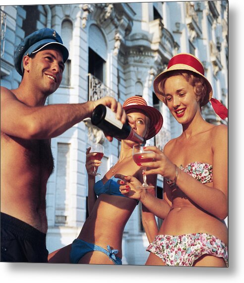 1950-1959 Metal Print featuring the photograph Top Up by Slim Aarons