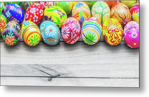 Easter Metal Print featuring the photograph Easter handmade eggs on wooden table. #1 by Michal Bednarek