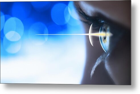 People Metal Print featuring the photograph Studio shot of light beam coming from eye #1 by Tetra Images
