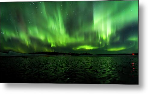 Aurora Metal Print featuring the photograph Emerald Veil Over Frozen Terrain by Kyle Lavey