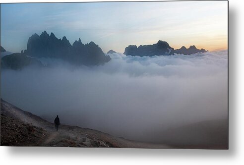 Italian Alps Metal Print featuring the photograph Unrecognized man trekking at the hiking path at Tre Cime in South Tyrol in Italy. by Michalakis Ppalis