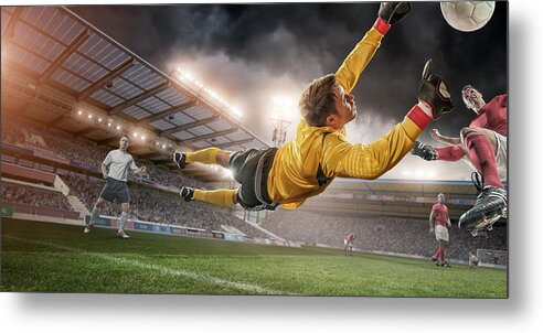 Soccer Uniform Metal Print featuring the photograph Soccer Goalie In Mid Air Save by Peepo