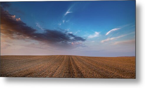 Nightfall Metal Print featuring the photograph Agricultural meadow field and cloudy sky during sunset. by Michalakis Ppalis