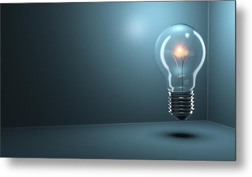 Mid-air Metal Print featuring the photograph Light Bulb Glowing by Jonathan Kitchen