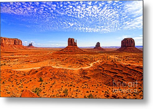 Landscape Metal Print featuring the photograph Monument Valley by Jason Abando