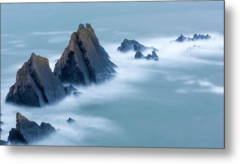 Scenics Metal Print featuring the photograph Swirling Tide Around Jagged Rocks by Sebastian Wasek